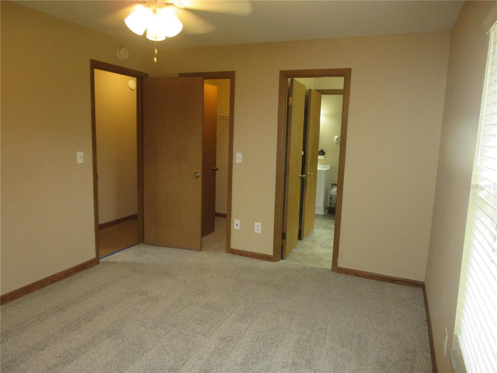 2601 Southeast 175th Terrace Road Silver Springs, FL 34488 - Photo 47 of 87 a view of an empty room with a window