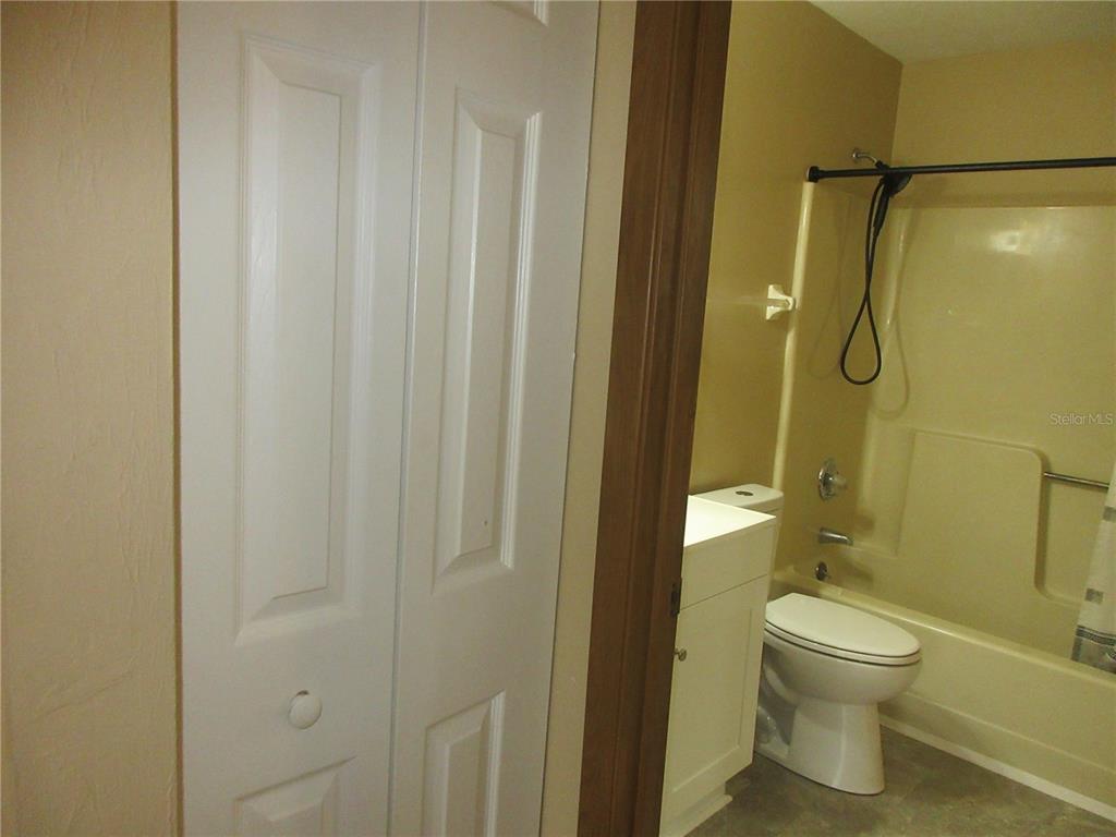 2601 Southeast 175th Terrace Road Silver Springs, FL 34488 - Photo 51 of 87 a bathroom with a toilet and a shower