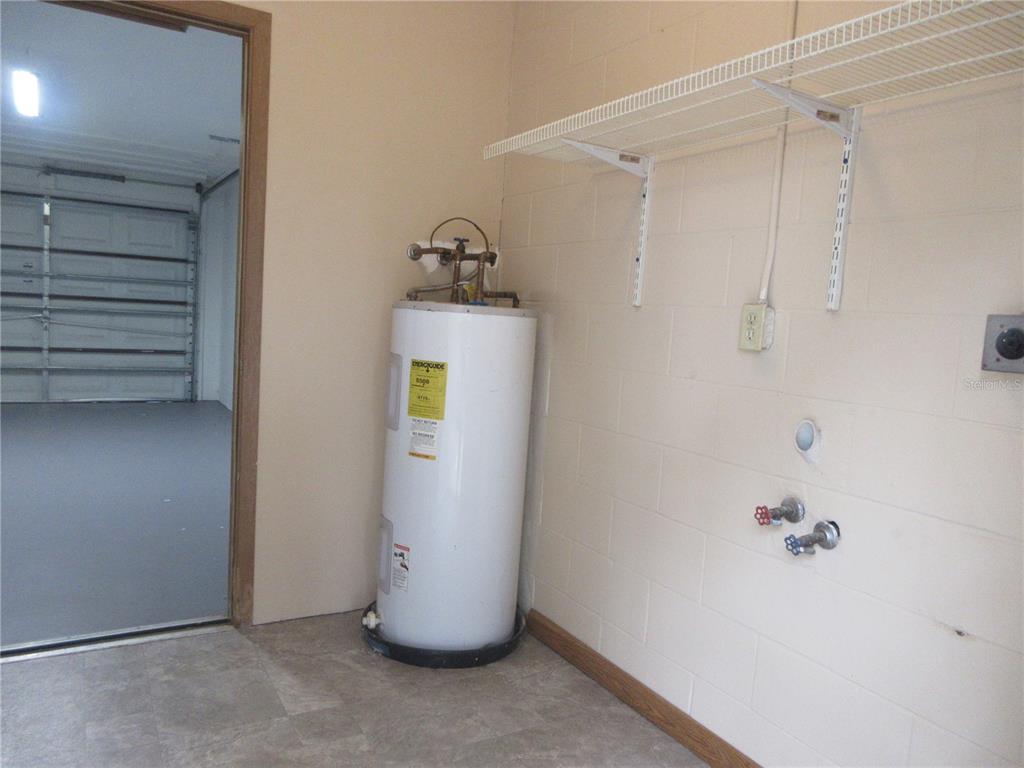2601 Southeast 175th Terrace Road Silver Springs, FL 34488 - Photo 53 of 87 a view of storage and utility room with closet