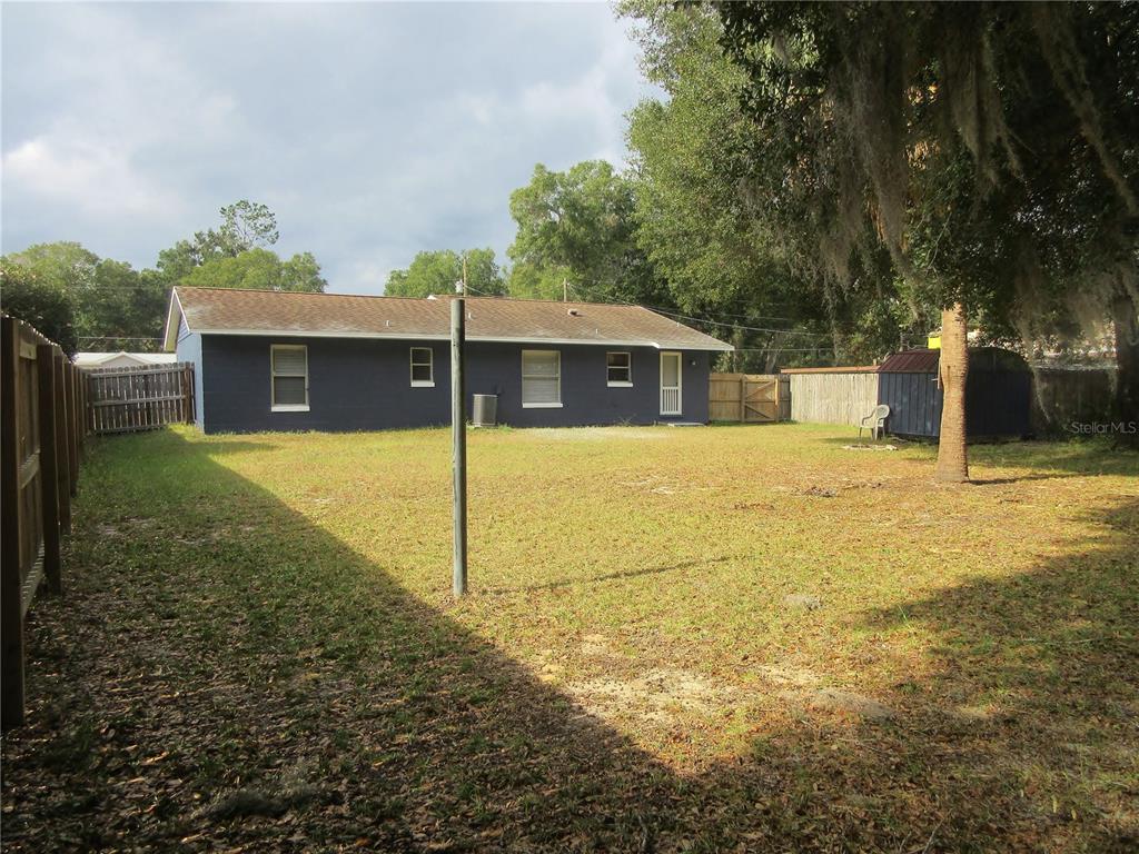 2601 Southeast 175th Terrace Road Silver Springs, FL 34488 - Photo 10 of 87 a view of a house with a yard