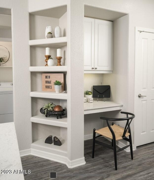 2910 South Greenfield Road, Unit 1 Gilbert, AZ 85295 - Photo 5 of 13 a room with a table and cabinets