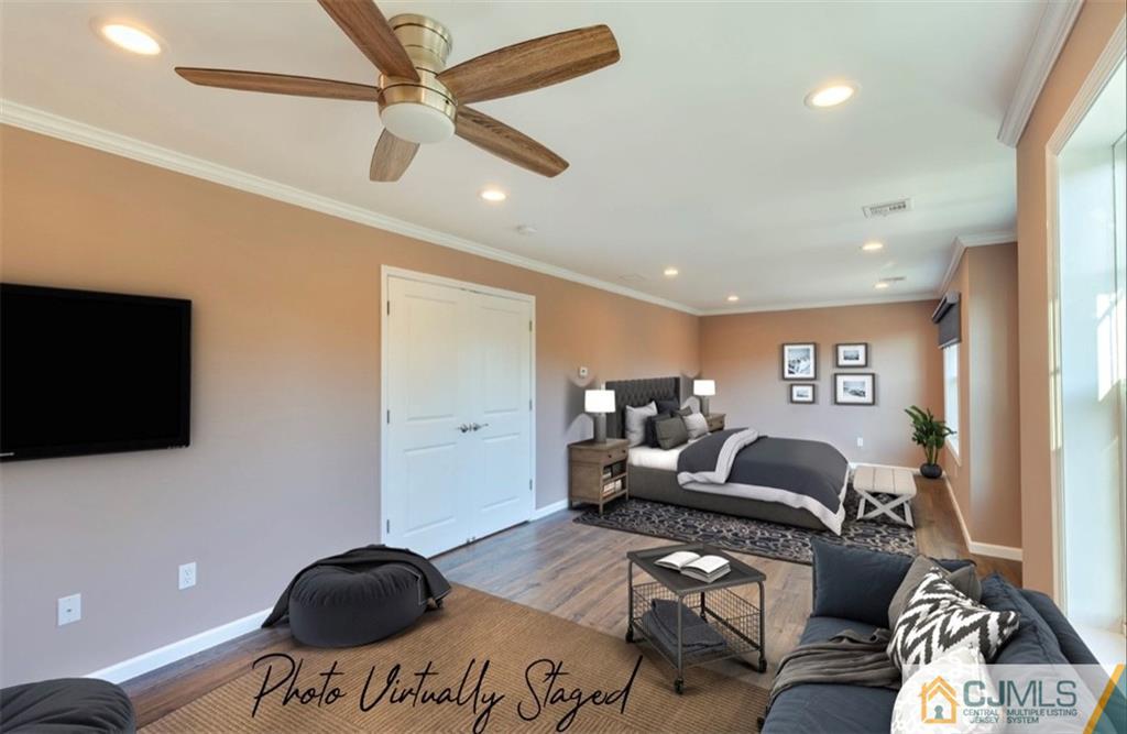 10 Markham Road Edison, NJ 08817 - Photo 14 of 23 a living room with furniture and a flat screen tv