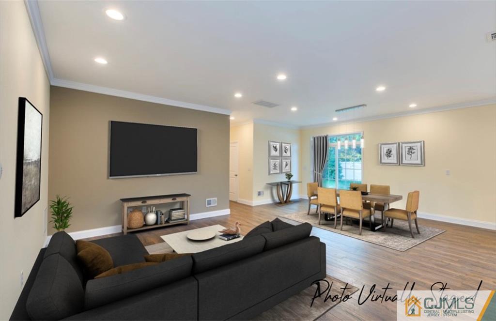 10 Markham Road Edison, NJ 08817 - Photo 8 of 23 a living room with furniture and a flat screen tv