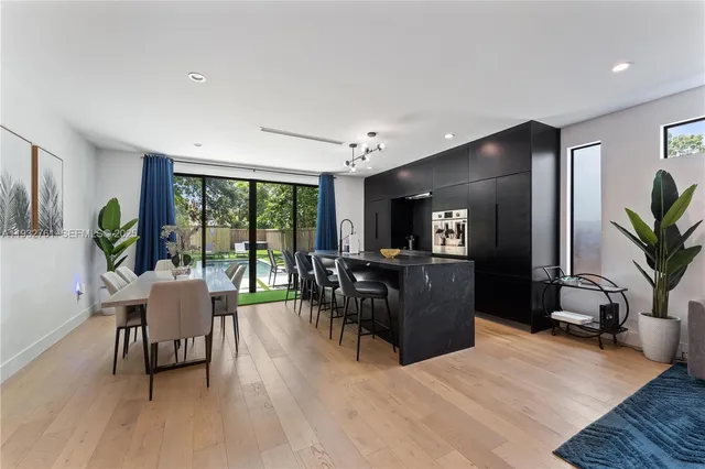 a kitchen with kitchen island granite countertop lots of counter top space