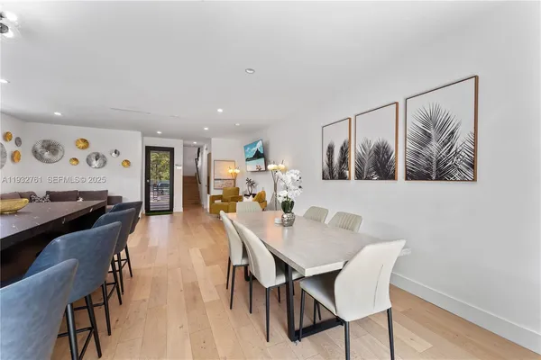 a large kitchen with stainless steel appliances lots of counter space
