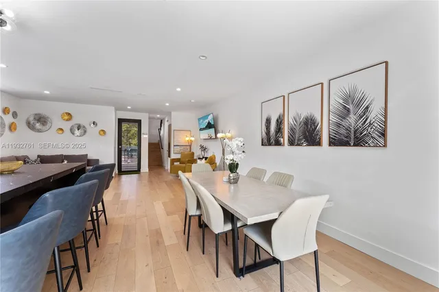 a large kitchen with stainless steel appliances lots of counter space