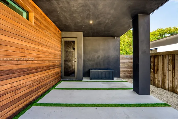 a view of swimming pool from a balcony