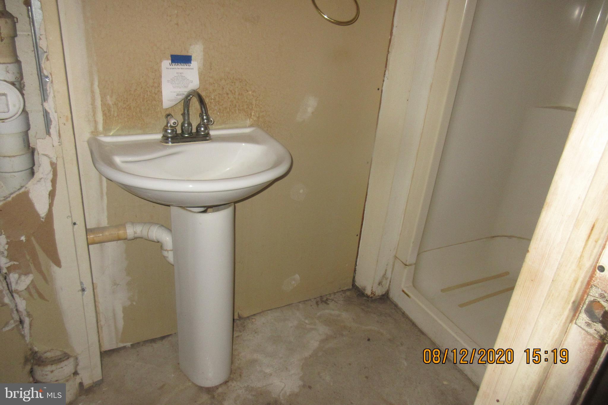 4449 Scotia Road Baltimore, MD 21227 - Photo 12 of 16 Basement Bathroom