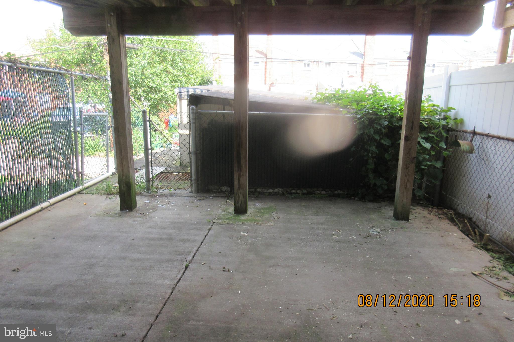 4449 Scotia Road Baltimore, MD 21227 - Photo 4 of 16 Walkout Patio