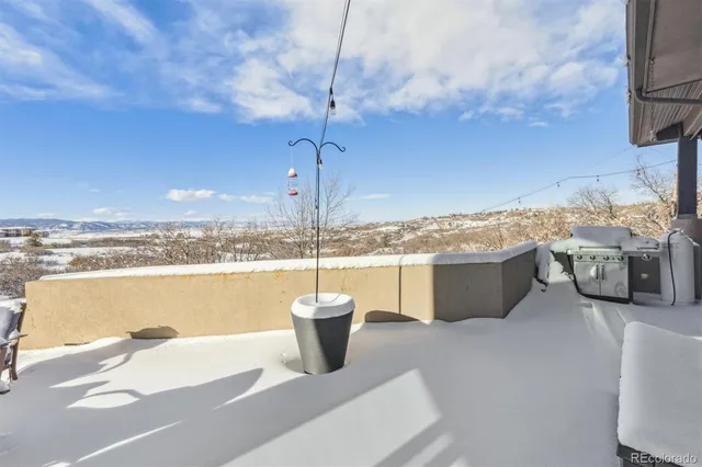 a view of a terrace with wooden floor