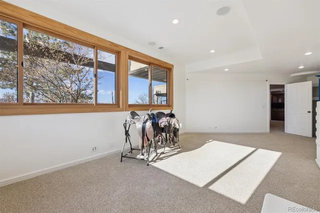 a room with furniture window and a dresser