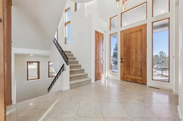 a view of an entryway with staircase