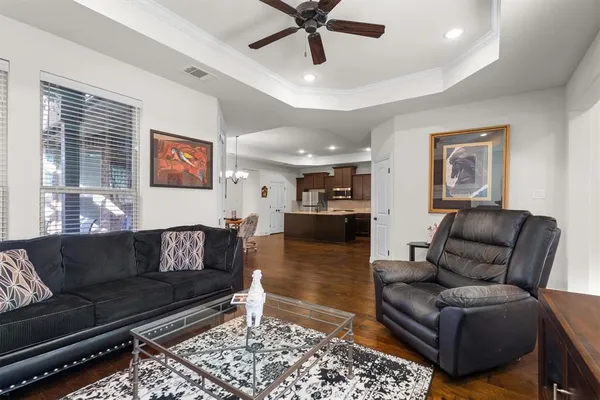 a living room with furniture and a rug