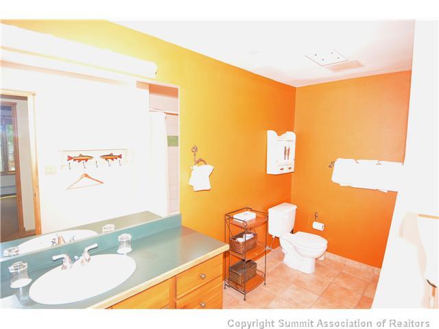 195 River Run Road, Unit 8037 Dillon, CO 80435 - Photo 13 of 25 a bathroom with a sink mirror and a toilet