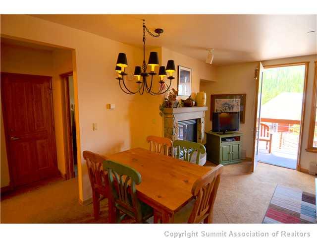 195 River Run Road, Unit 8037 Dillon, CO 80435 - Photo 4 of 25 a view of a dining room with furniture and a window