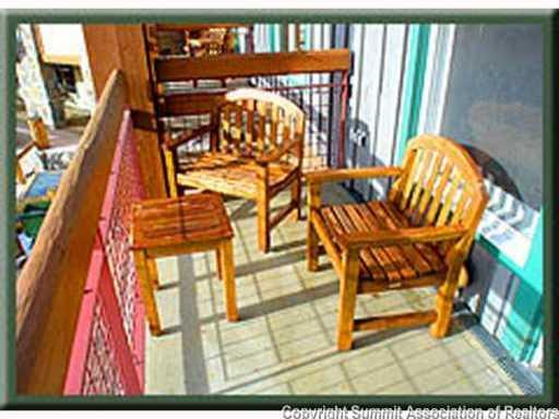 195 River Run Road, Unit 8037 Dillon, CO 80435 - Photo 7 of 25 a view of a chairs and table in the balcony
