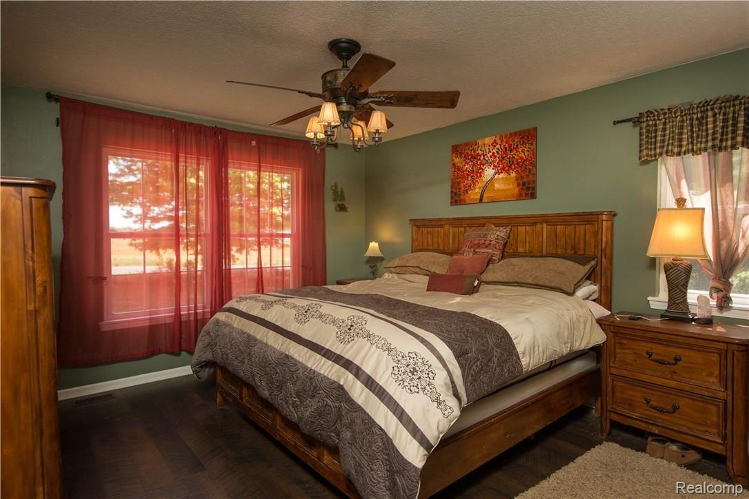 14928 South Fowlerville Road Perry, MI 48872 - Photo 8 of 27 14928 S Fowlerville Rd-Perry-masterbed.jpg