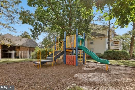 106 Lassen Court, Unit 5 Princeton, NJ 08540 - Photo 16 of 19 a view of a house with a park