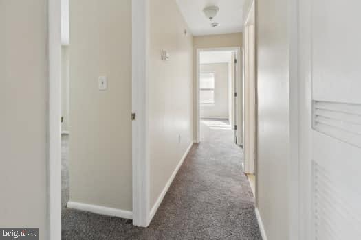 106 Lassen Court, Unit 5 Princeton, NJ 08540 - Photo 7 of 19 a view of a hallway to other door