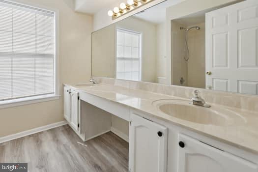 106 Lassen Court, Unit 5 Princeton, NJ 08540 - Photo 9 of 19 a bathroom with a sink and a mirror