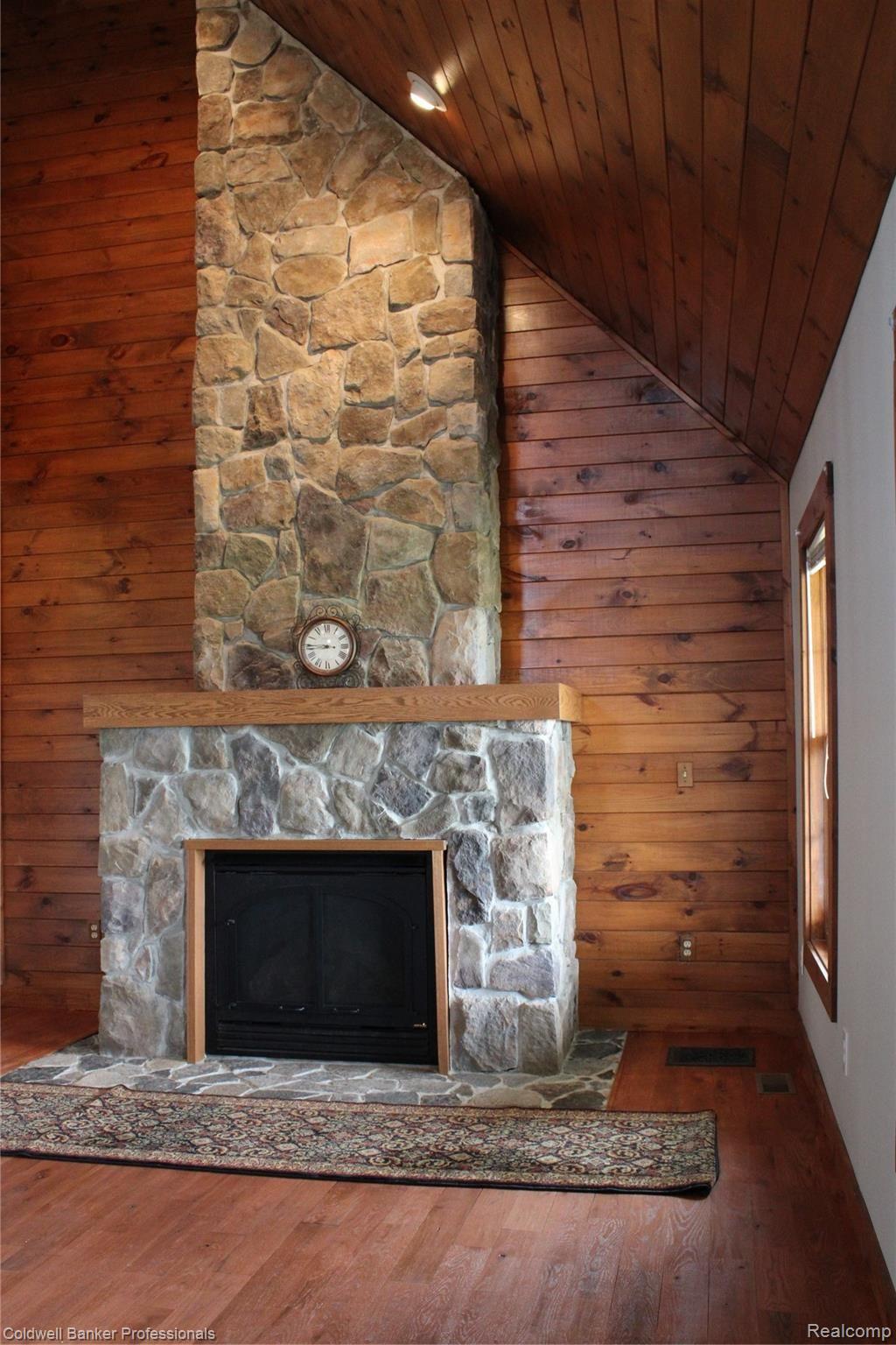 3878 Peters Road Columbiaville, MI 48421 - Photo 37 of 38 Awesome fireplace.JPG