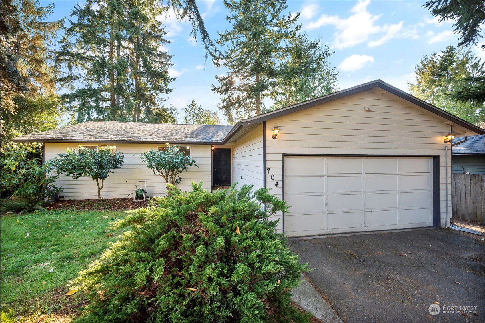 704 221st Street Southwest Bothell, WA 98021 - Photo 1 of 21 a view of a garage