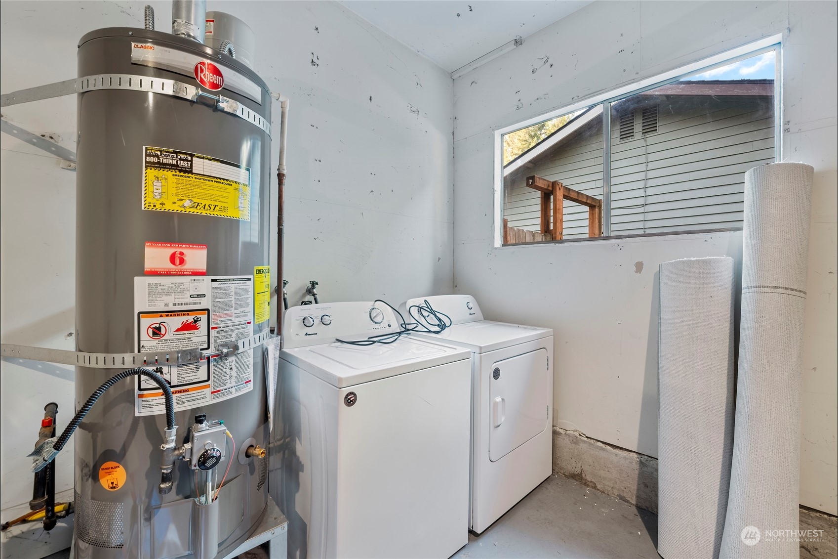 704 221st Street Southwest Bothell, WA 98021 - Photo 19 of 21 a utility room with dryer and washer