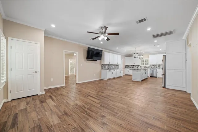a view of living room with granite countertop furniture and fireplace
