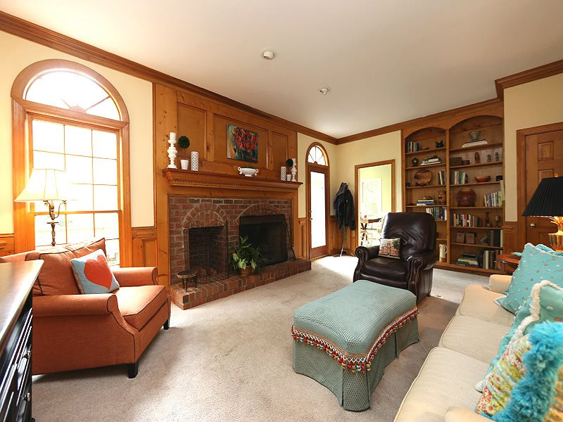2804 Royster Street Raleigh, NC 27608 - Photo 7 of 20 Built-in bookcases, large closet, wood burning stove and beautiful paneling in this wonderful room. Family Room