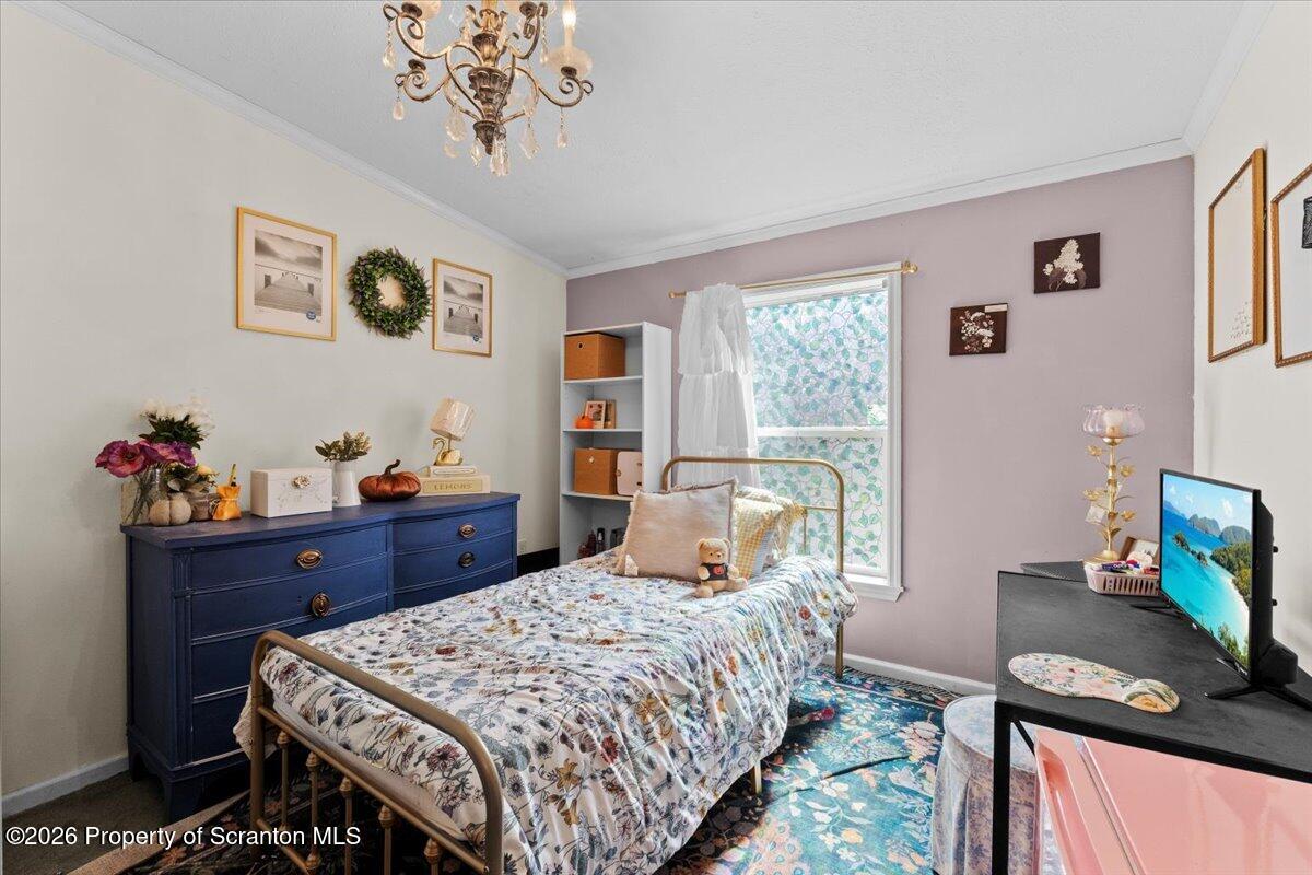 396 Park Road Dingmans Ferry, PA 18328 - Photo 28 of 39 a bedroom with a bed and a table in it