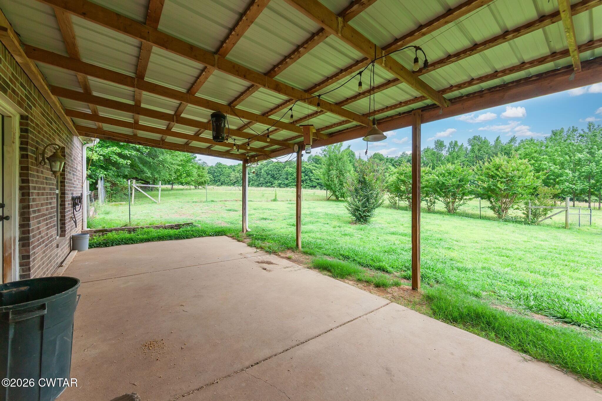 4080 Beech Bluff Road Beech Bluff, TN 38313 - Photo 39 of 41 a view of yard with tree and wooden fence