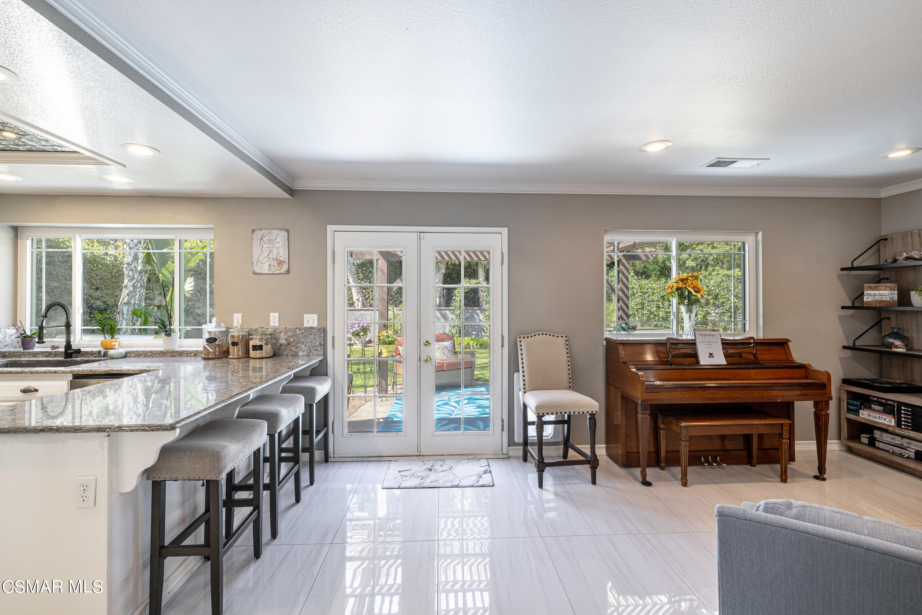 2087 Chenault Place Simi Valley, CA 93065 - Photo 12 of 36 a living room with furniture a piano and a large window