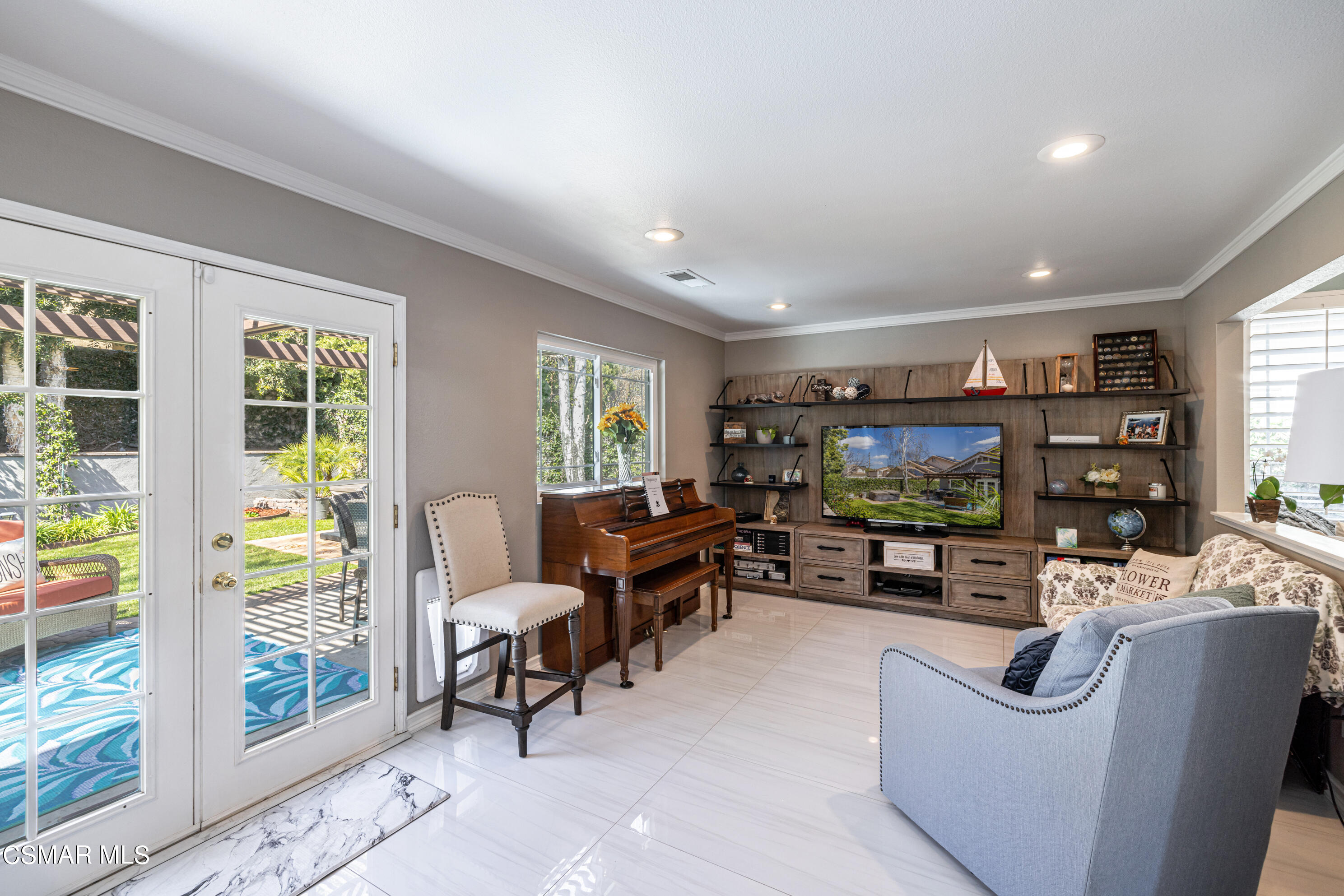 2087 Chenault Place Simi Valley, CA 93065 - Photo 13 of 36 a living room with furniture and a flat screen tv