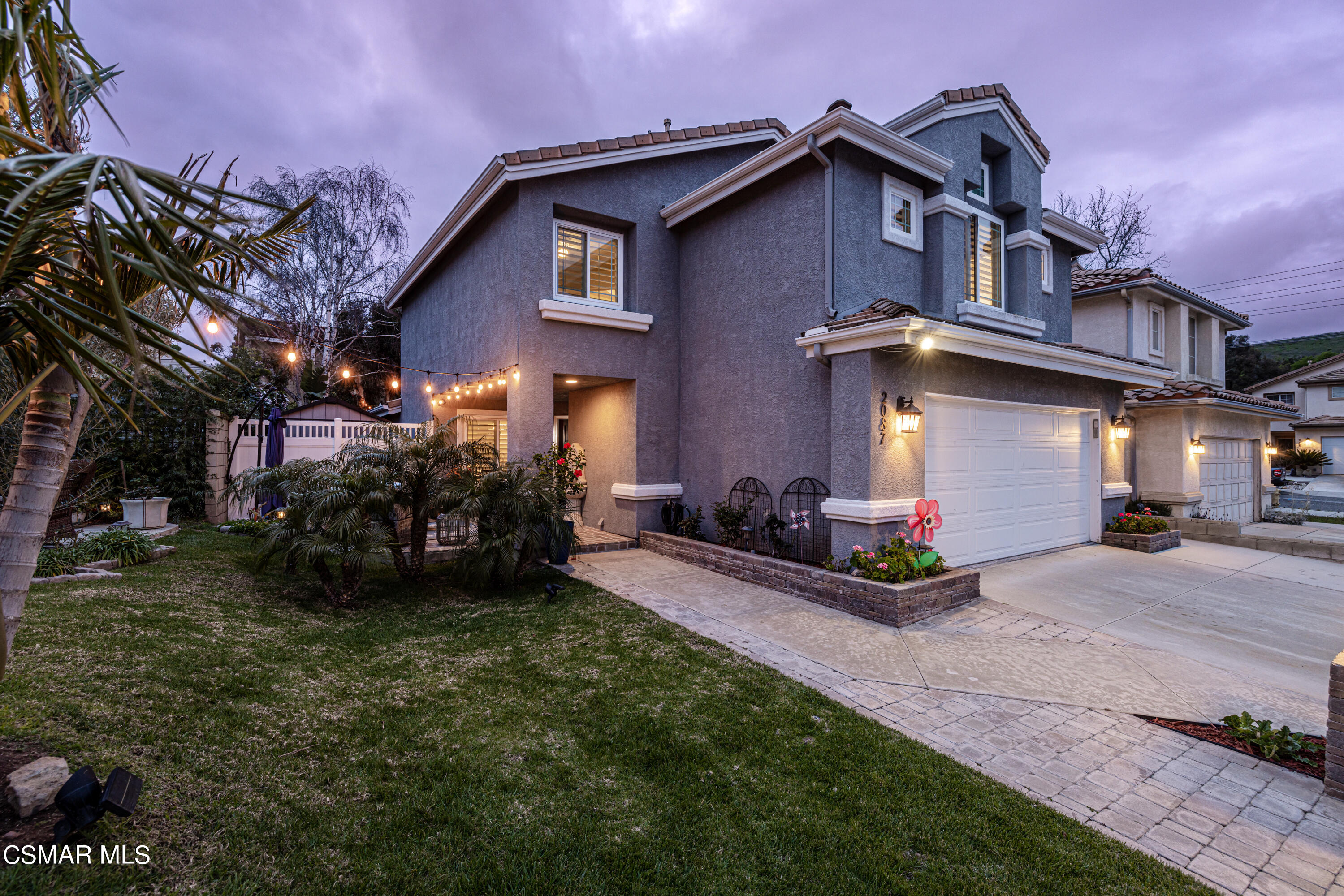 2087 Chenault Place Simi Valley, CA 93065 - Photo 2 of 36 a view of a house with a yard and a fire pit
