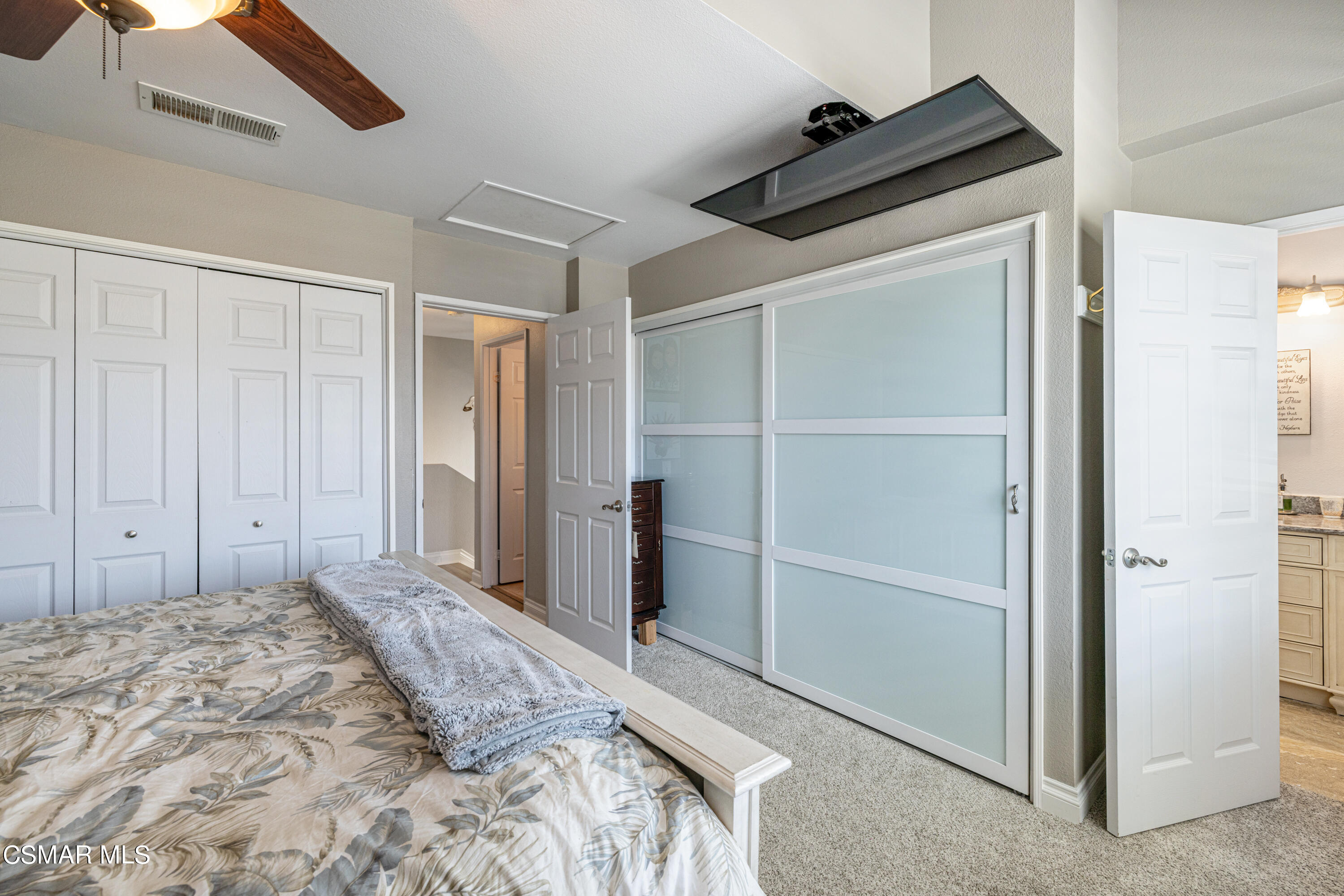 2087 Chenault Place Simi Valley, CA 93065 - Photo 22 of 36 a bedroom with a bed and a cabinet