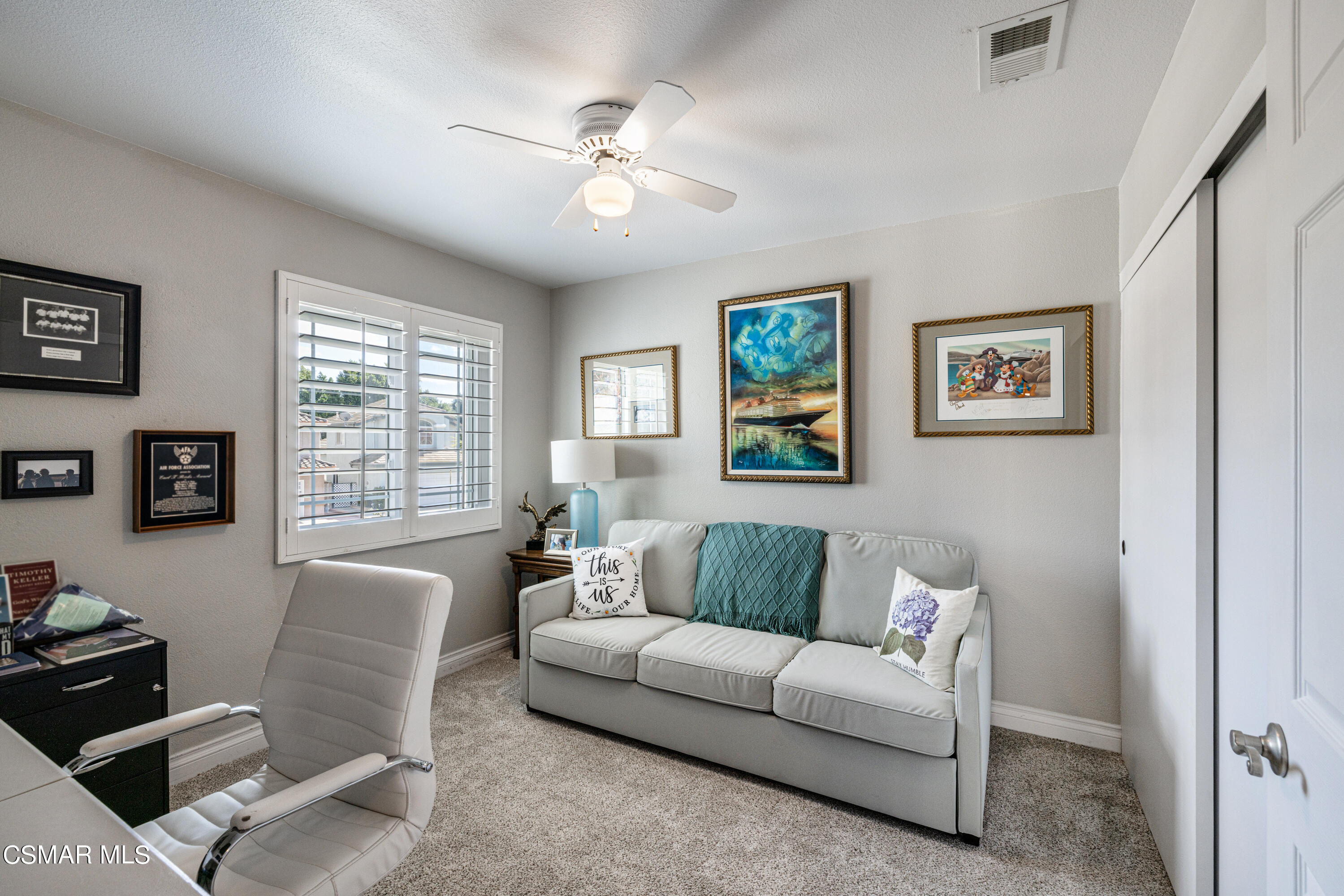 2087 Chenault Place Simi Valley, CA 93065 - Photo 25 of 36 a living room with furniture and a flat screen tv