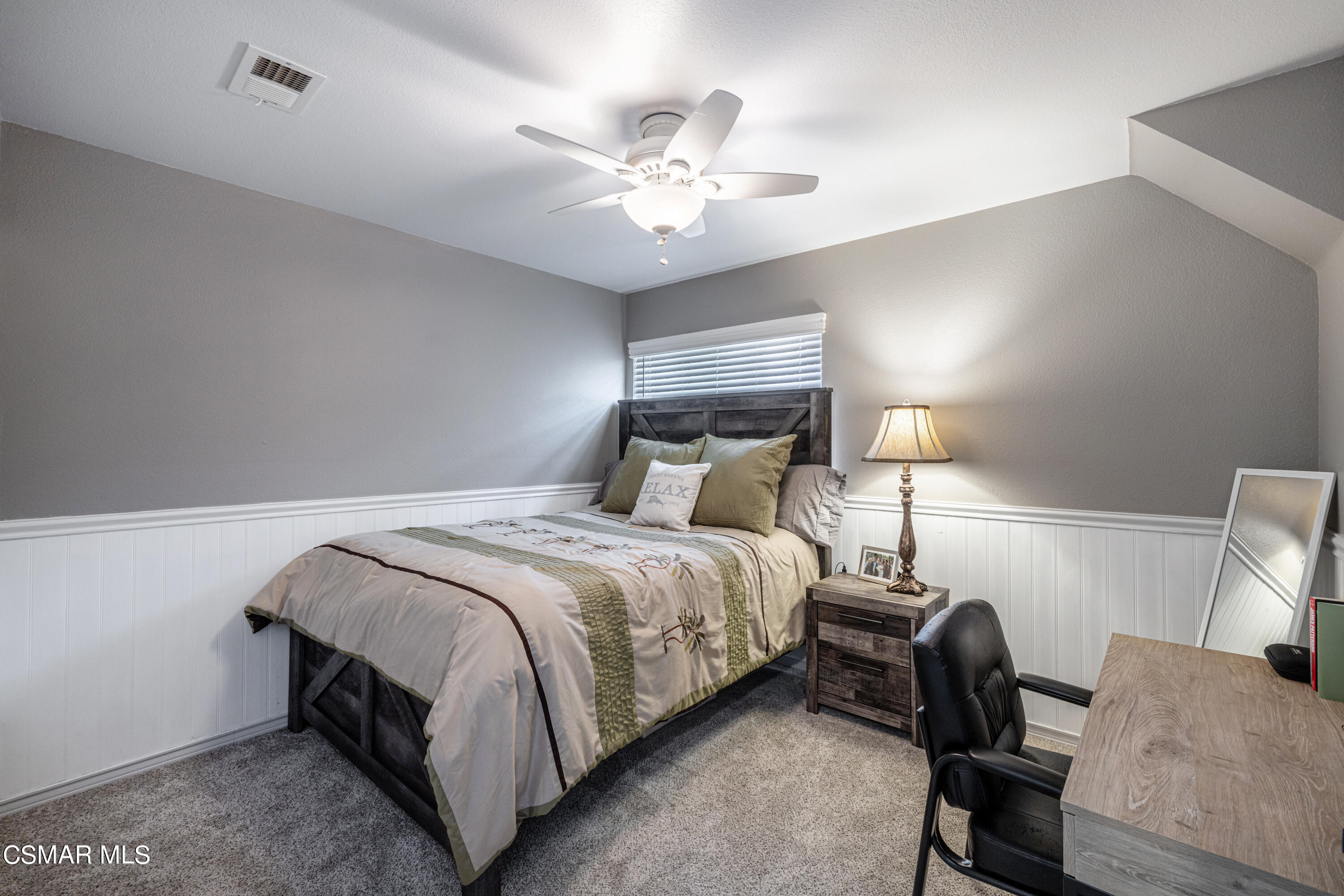 2087 Chenault Place Simi Valley, CA 93065 - Photo 26 of 36 a bedroom with a bed and a chandelier