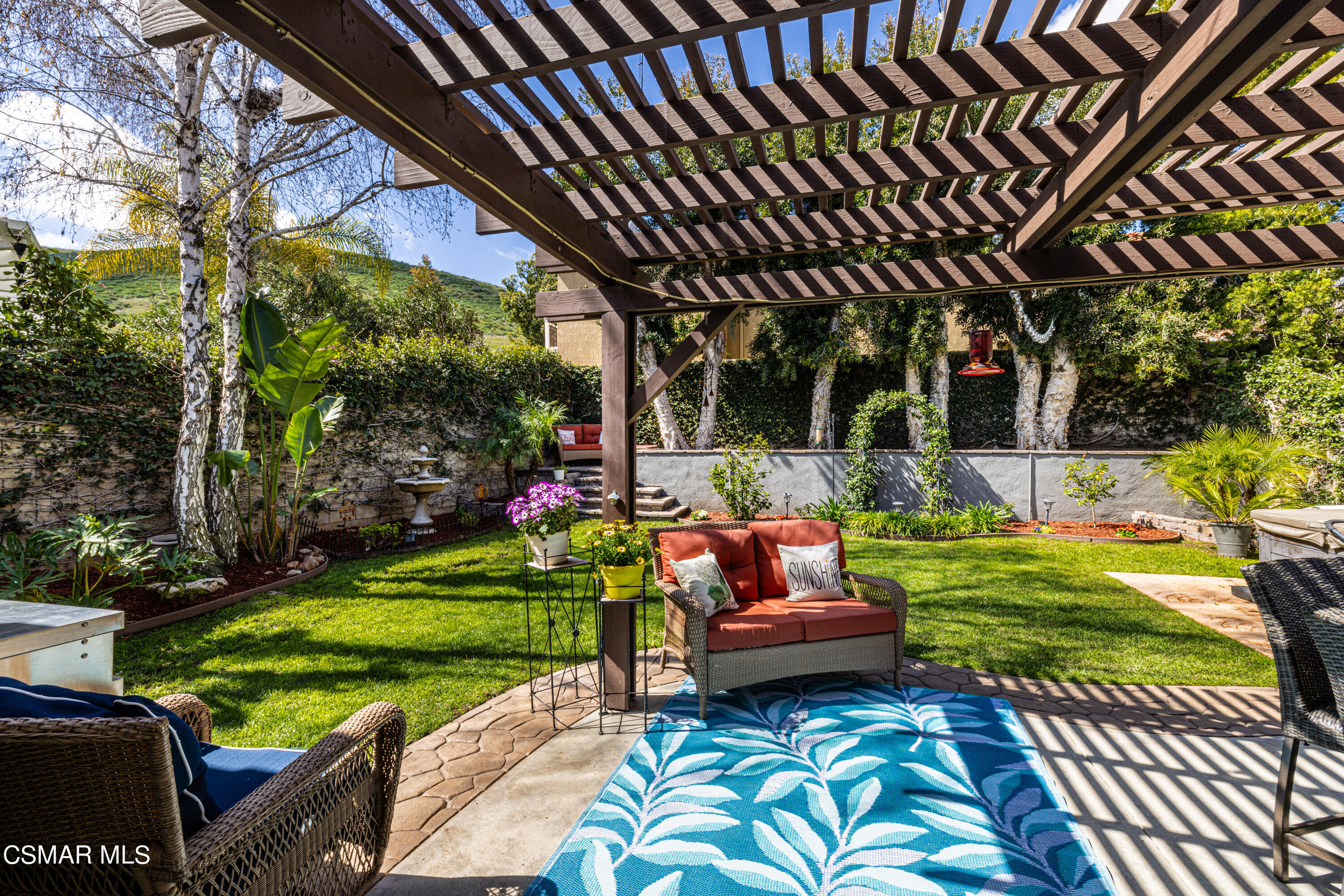 2087 Chenault Place Simi Valley, CA 93065 - Photo 27 of 36 a outdoor living space with furniture and garden view