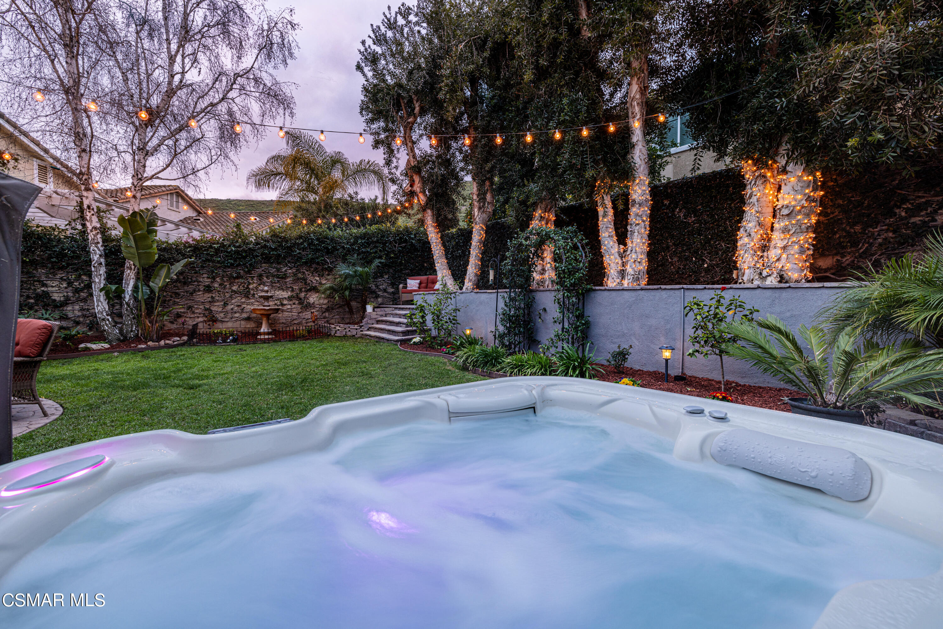 2087 Chenault Place Simi Valley, CA 93065 - Photo 31 of 36 a front view of a house with a yard and a tree