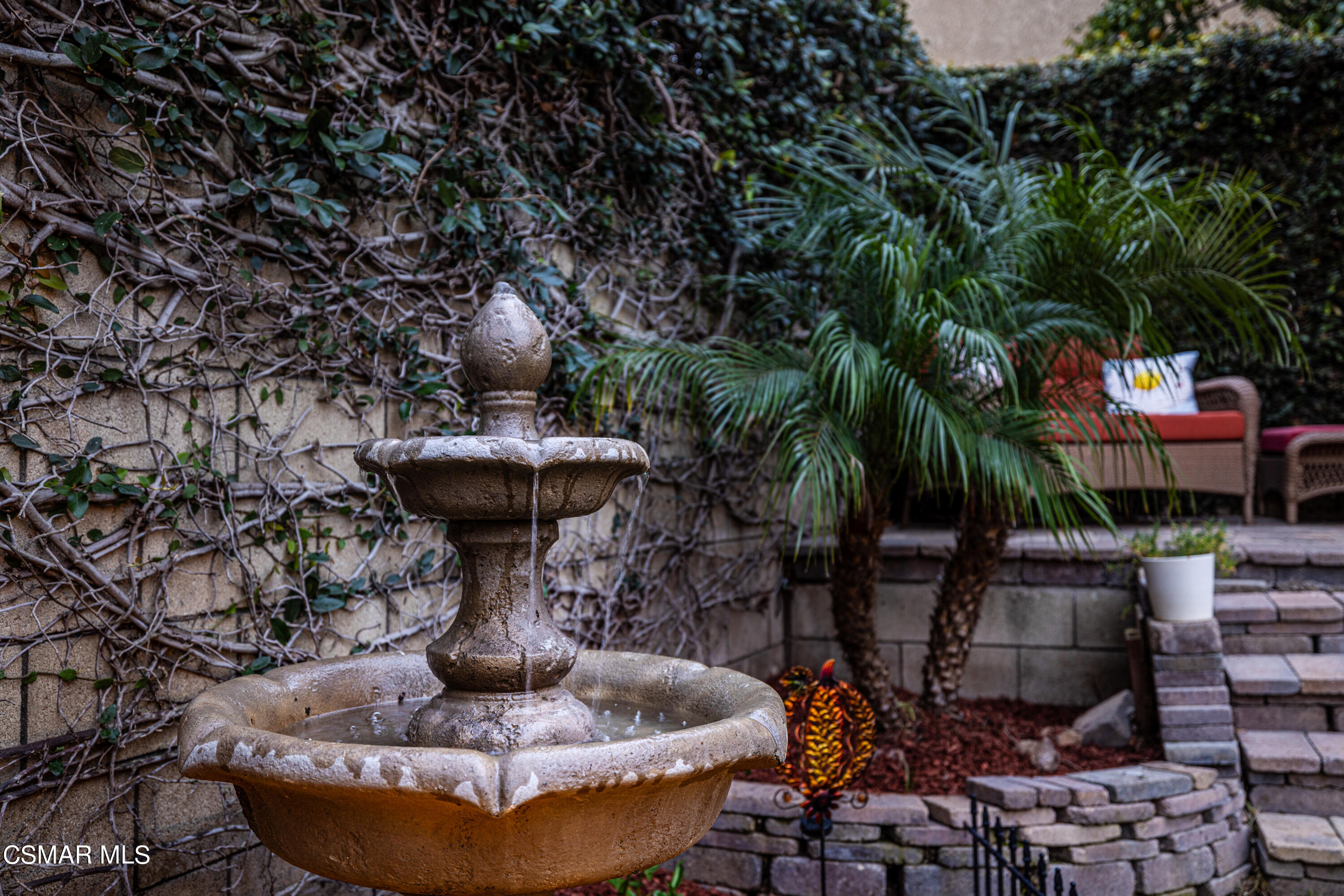 2087 Chenault Place Simi Valley, CA 93065 - Photo 32 of 36 a view of a fountain in the backyard of house