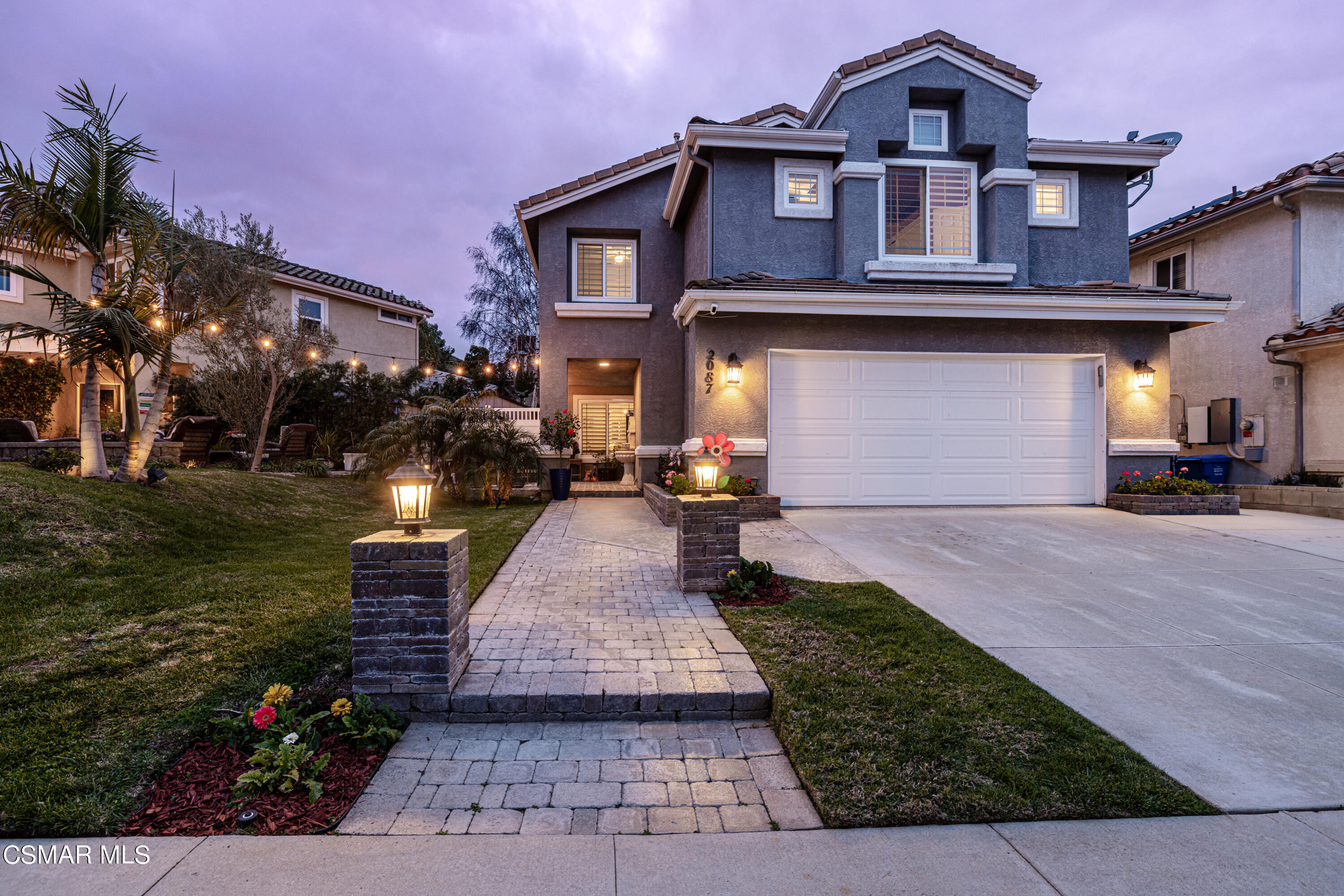 2087 Chenault Place Simi Valley, CA 93065 - Photo 33 of 36 a front view of a house with a yard