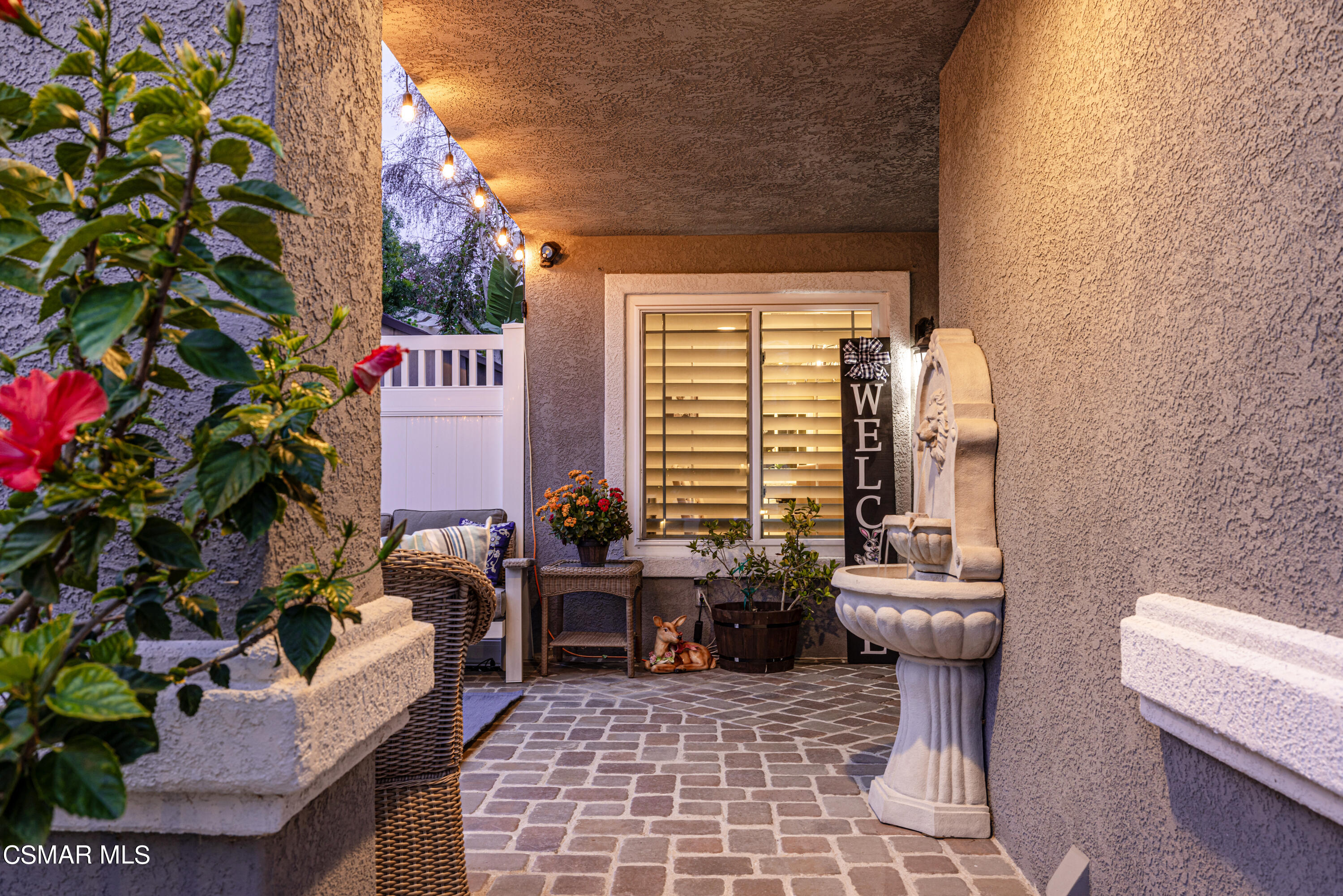 2087 Chenault Place Simi Valley, CA 93065 - Photo 4 of 36 a backyard of a house with seating space