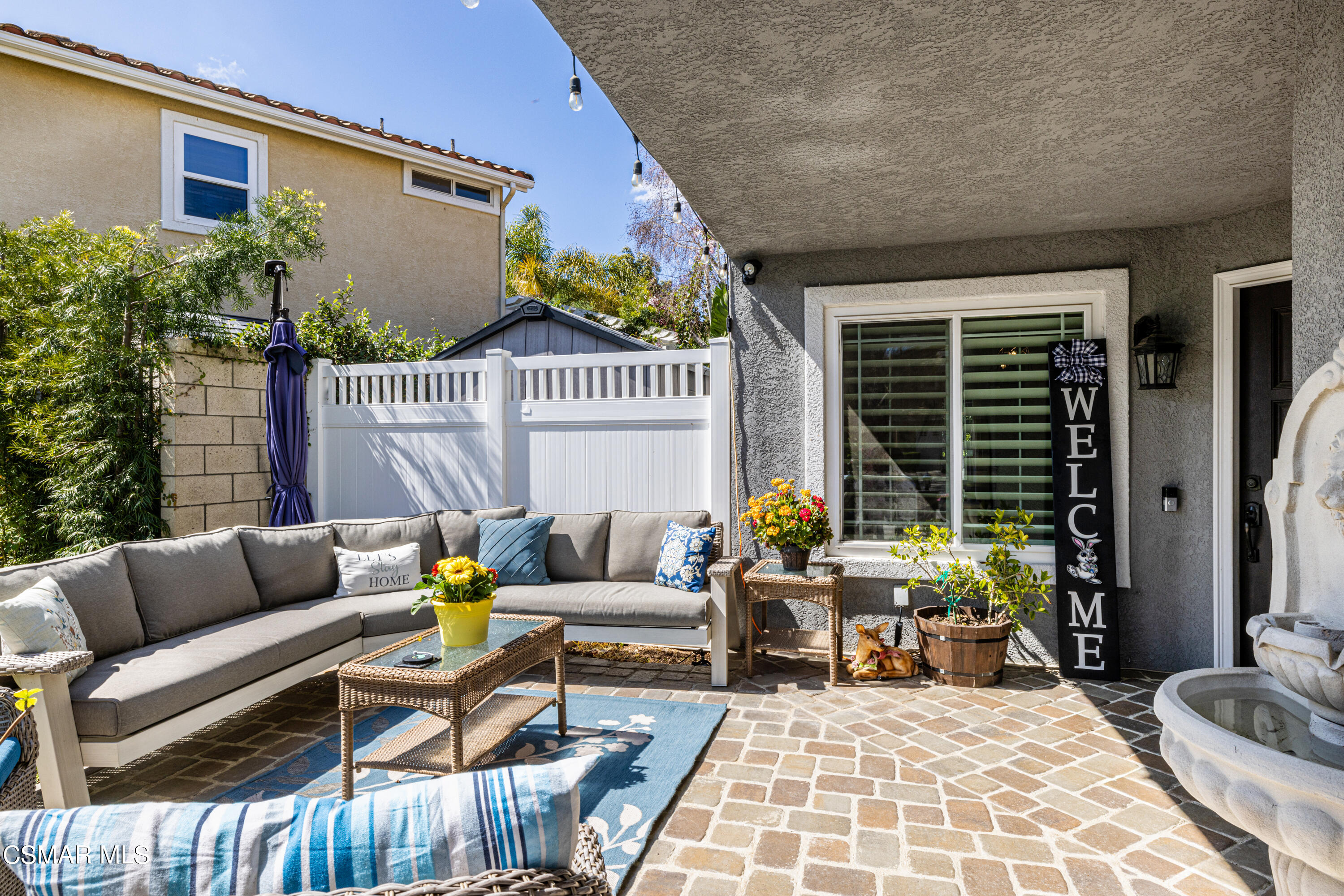2087 Chenault Place Simi Valley, CA 93065 - Photo 5 of 36 a balcony with furniture and floor to ceiling window