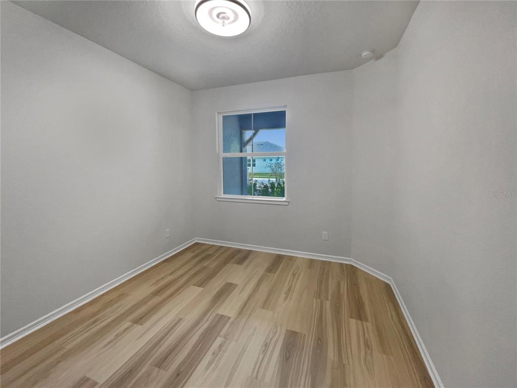 1909 Spring Shower Circle Kissimmee, FL 34744 - Photo 17 of 32 a view of room with window