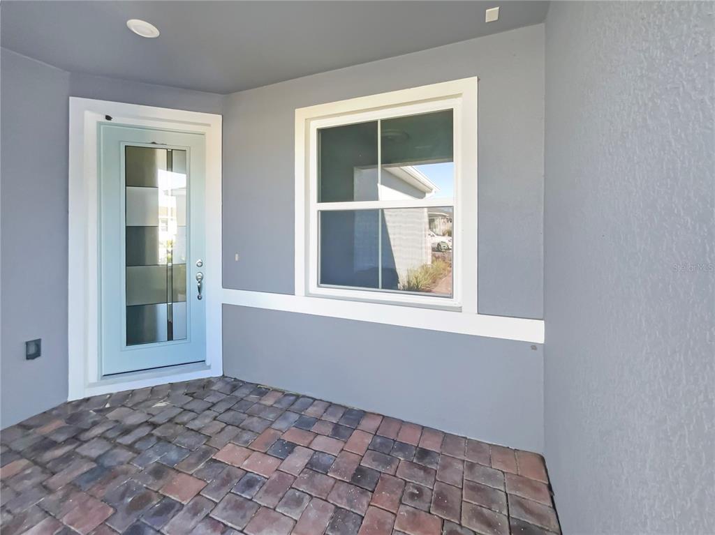 1909 Spring Shower Circle Kissimmee, FL 34744 - Photo 9 of 32 a view of an empty room with a window