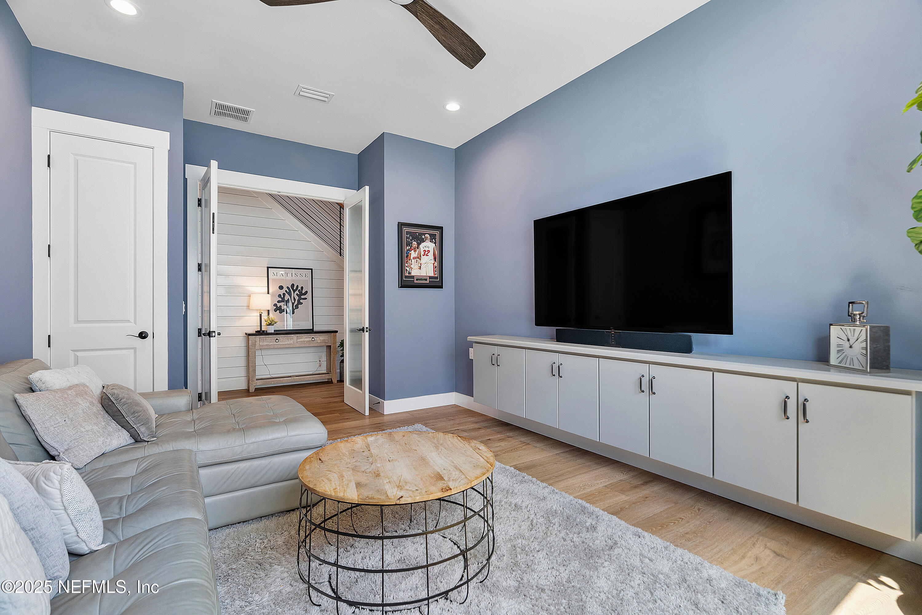 295 Seahill Drive St. Augustine, FL 32092 - Photo 14 of 101 a living room with furniture and a flat screen tv