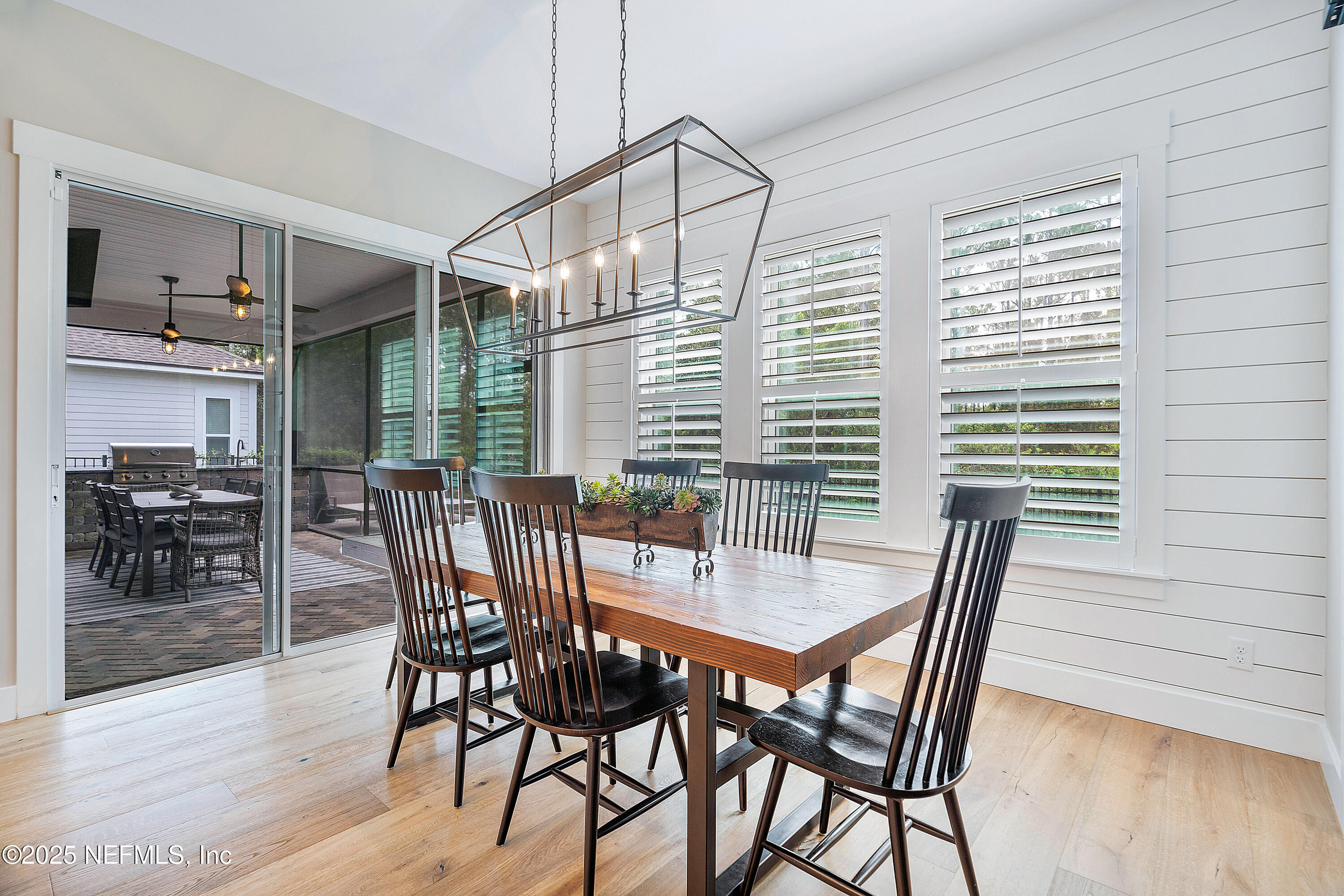 295 Seahill Drive St. Augustine, FL 32092 - Photo 36 of 101 a dining room with furniture and wooden floor