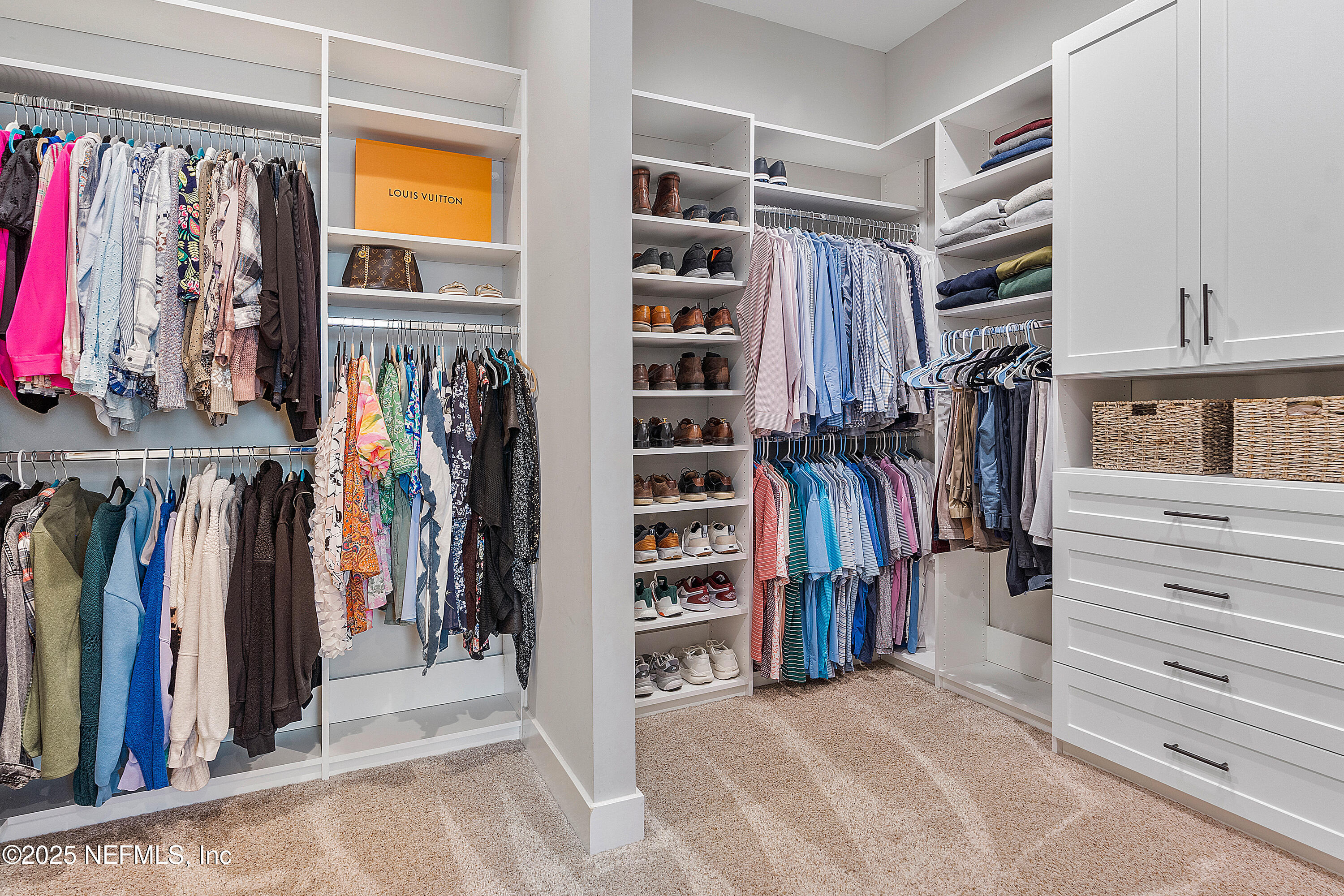 295 Seahill Drive St. Augustine, FL 32092 - Photo 51 of 101 a view of walk in closet with clothes and shoes
