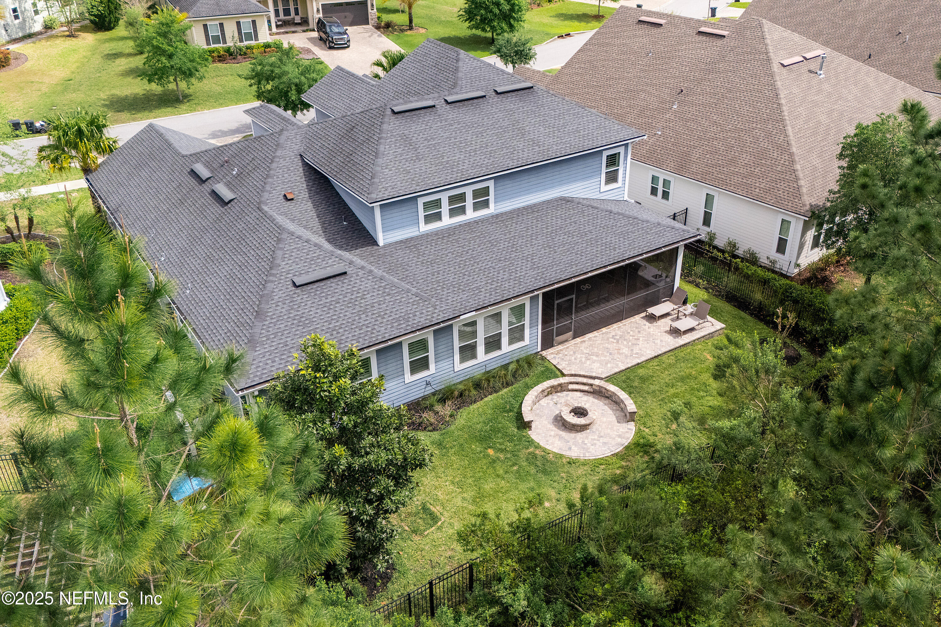 295 Seahill Drive St. Augustine, FL 32092 - Photo 71 of 101 an aerial view of a house with table and chairs