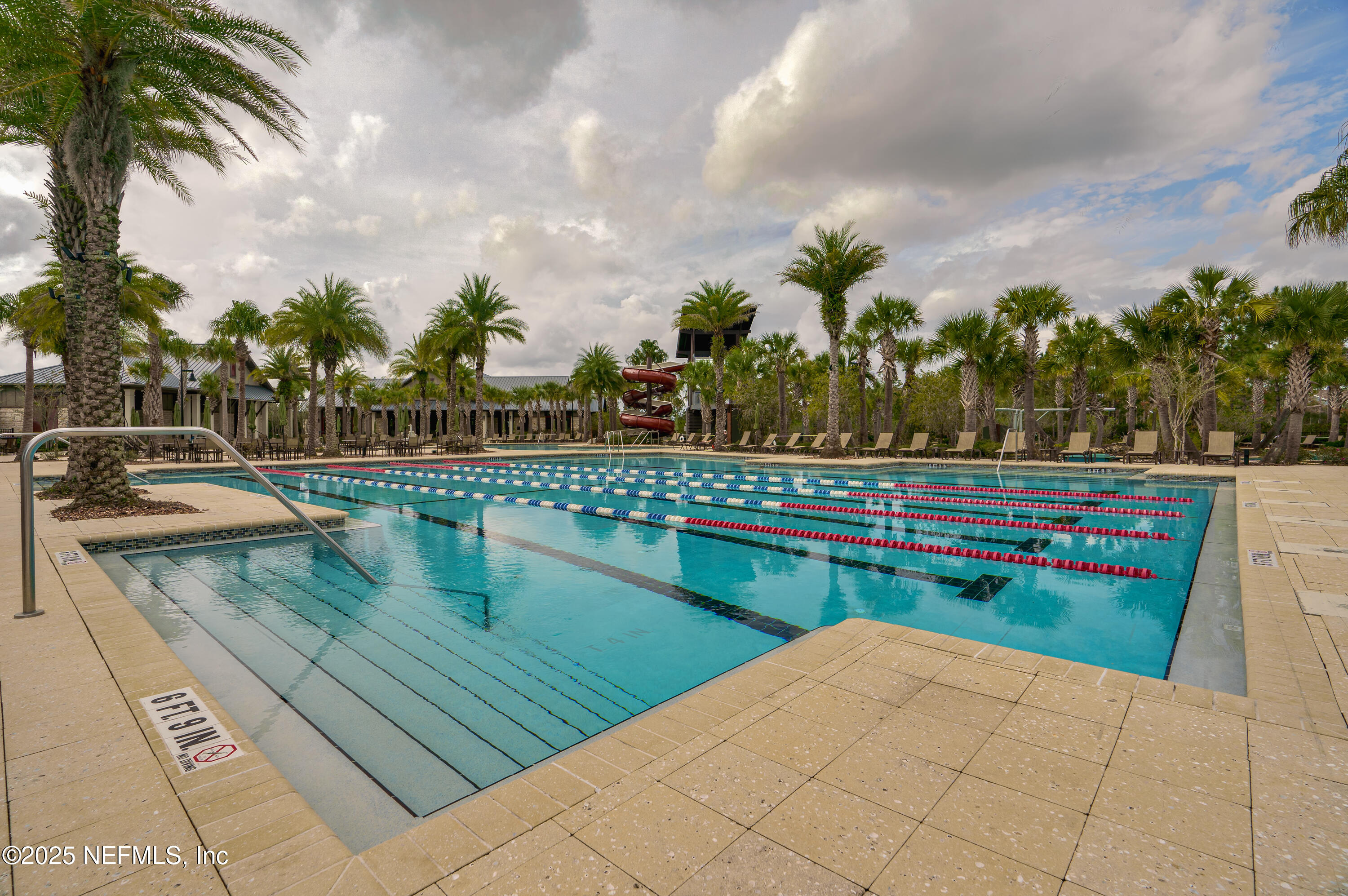 295 Seahill Drive St. Augustine, FL 32092 - Photo 91 of 101 a view of swimming pool with outdoor seating and plants